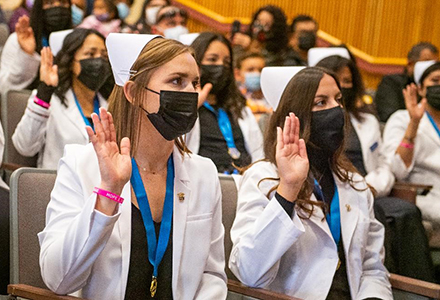 AHC nursing students taking an oath.
